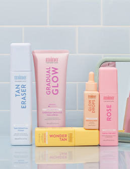 Group photo of various MineTan products. Tan eraser, Gradual glow, Rose spray, Glow drops, and Wonder tan serum